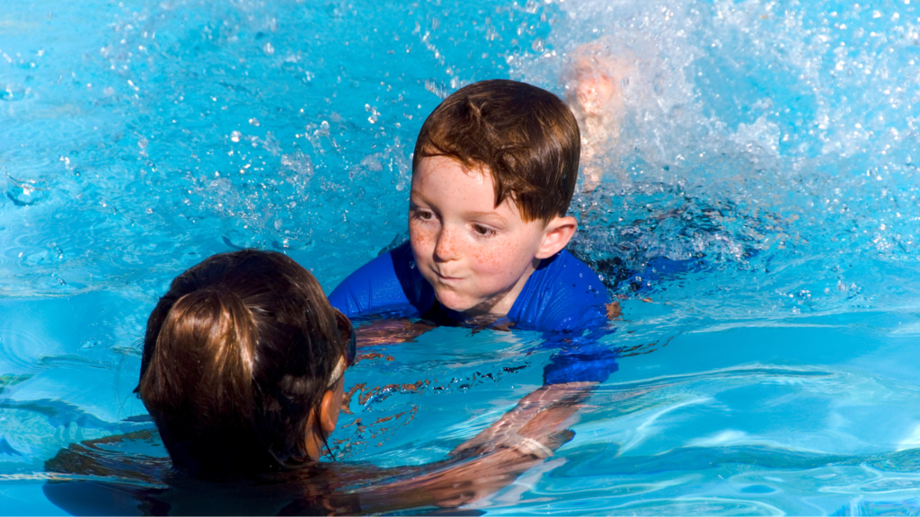 Boy learning how to swim